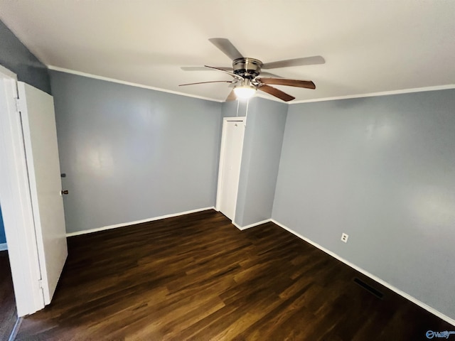 1315 Colbert Ave, Gadsden, AL 35904 - spare room featuring ornamental molding, dark wood-type flooring, and ceiling fan