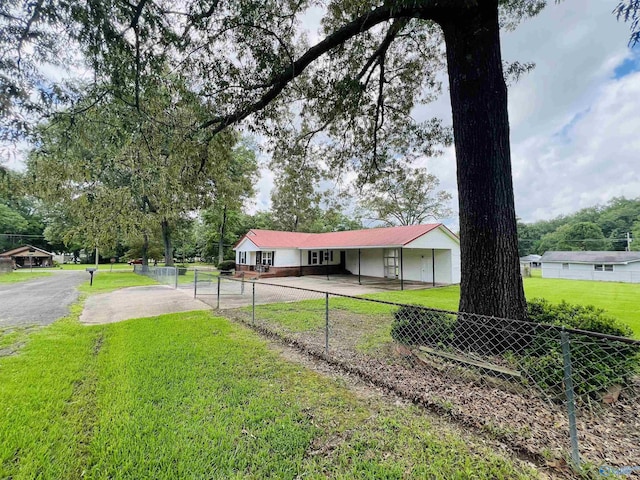 1315 Colbert Ave, Gadsden, AL 35904 - view of front of house featuring asphalt driveway and an attached carport