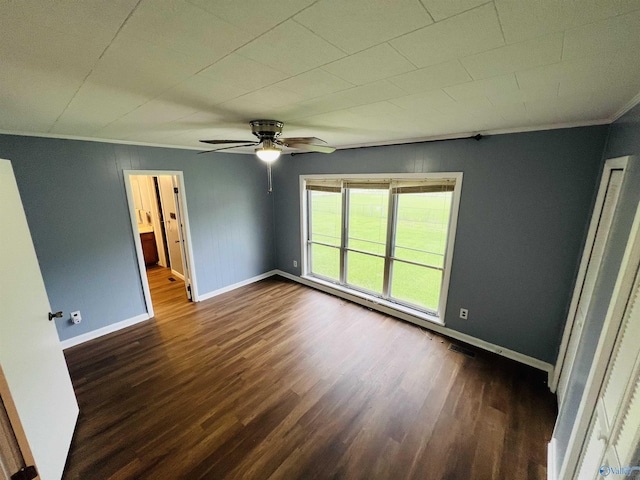 1315 Colbert Ave, Gadsden, AL 35904 - unfurnished room with dark wood-style flooring, a ceiling fan, and ornamental molding
