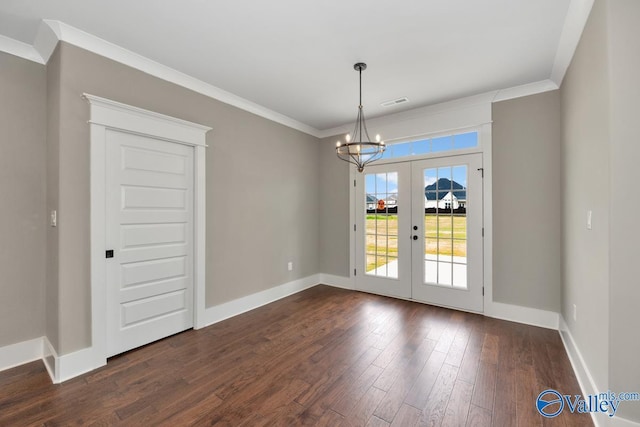 unfurnished dining area with french doors, crown molding, baseboards, and dark wood-style flooring