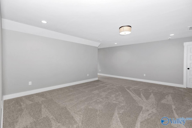 empty room with carpet flooring