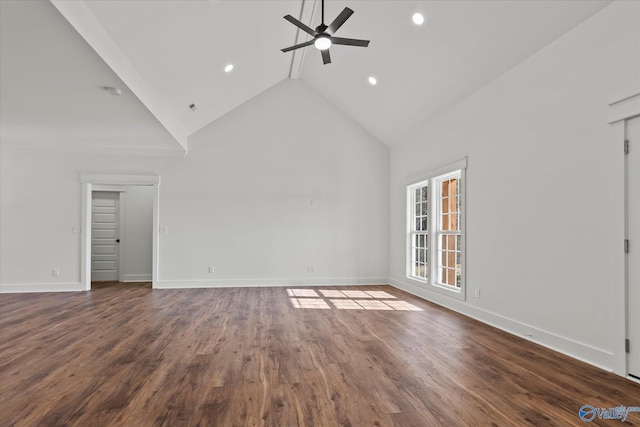 unfurnished living room with ceiling fan, wood-type flooring, and high vaulted ceiling