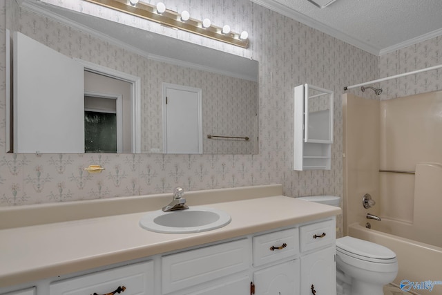 full bathroom featuring crown molding,  shower combination, vanity, a textured ceiling, and toilet