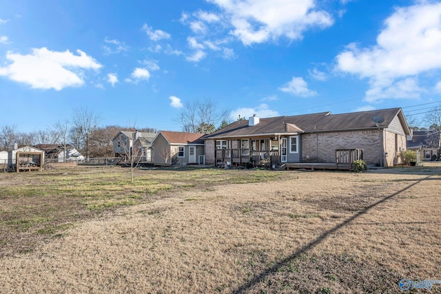 exterior space with a porch and a yard