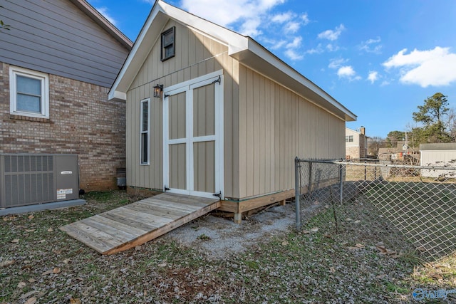 view of outdoor structure featuring central AC