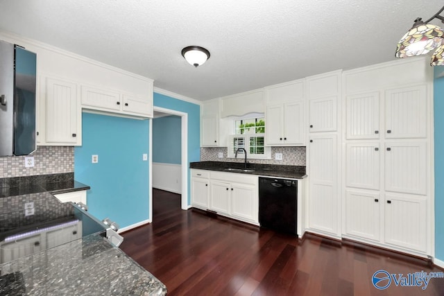 kitchen with dishwasher, backsplash, a sink, and dark wood-type flooring