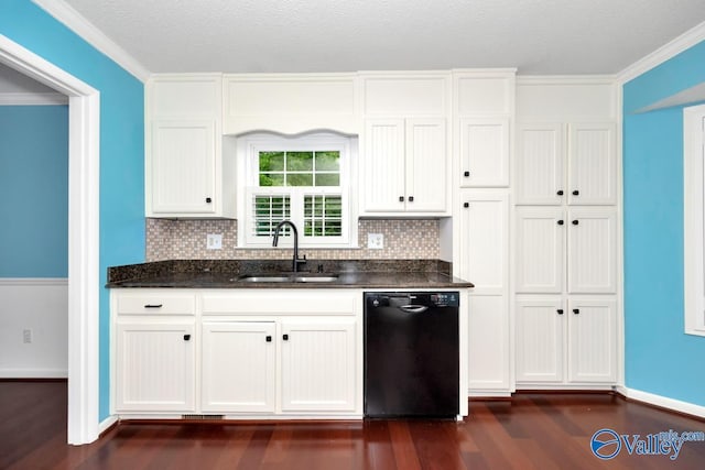 kitchen featuring dark wood finished floors, backsplash, black dishwasher, and a sink