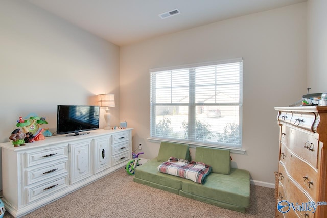 interior space featuring carpet