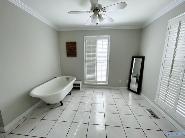 bathroom with crown molding, tile patterned flooring, a washtub, and ceiling fan