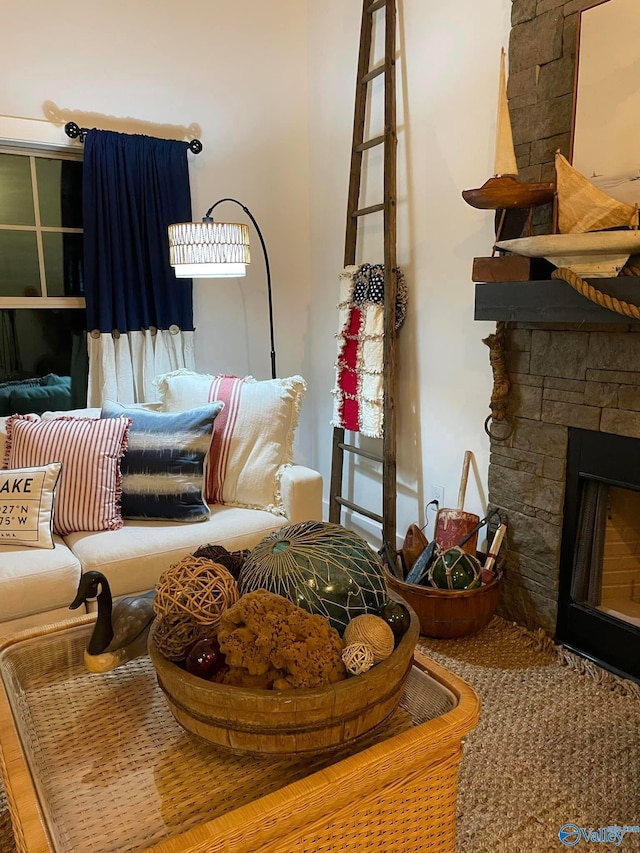 sitting room with a fireplace