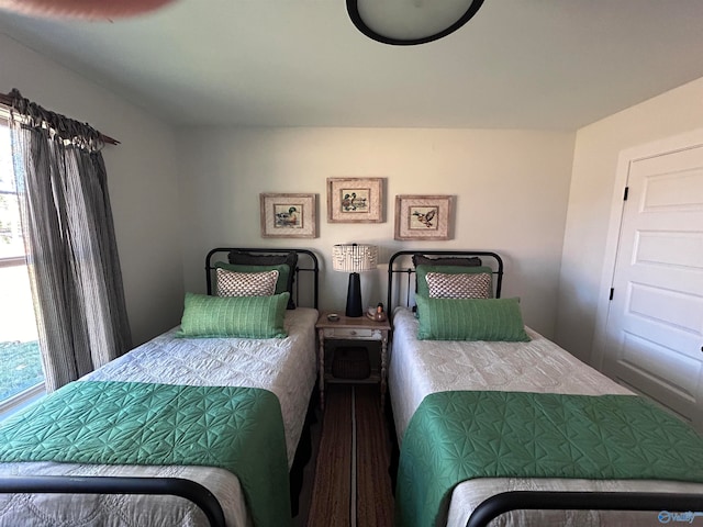 bedroom featuring wood-type flooring