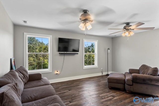 2403 Hog Jaw Rd, Arab, AL 35016 - living room featuring dark wood finished floors, visible vents, a ceiling fan, and baseboards