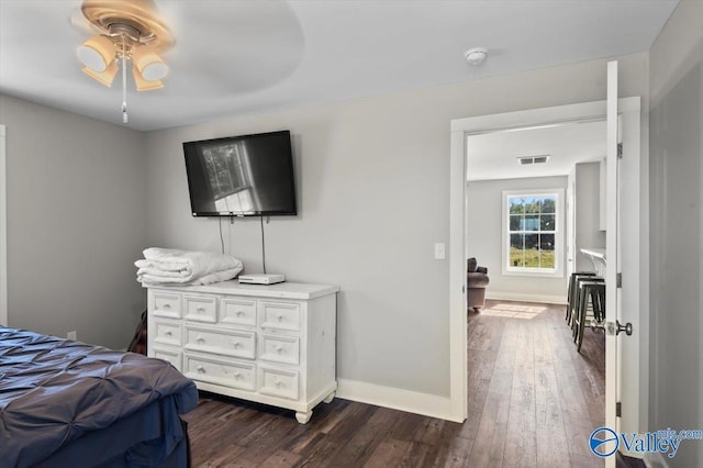 2403 Hog Jaw Rd, Arab, AL 35016 - bedroom featuring dark wood finished floors, visible vents, and baseboards
