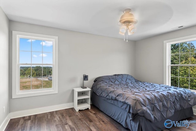 2403 Hog Jaw Rd, Arab, AL 35016 - bedroom featuring visible vents, wood finished floors, baseboards, and ceiling fan