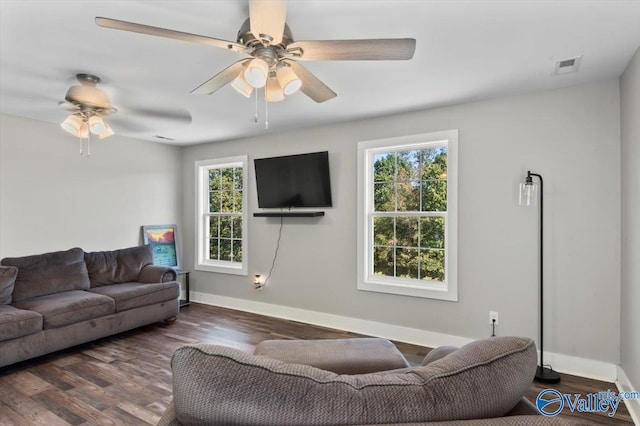 2403 Hog Jaw Rd, Arab, AL 35016 - living room featuring a ceiling fan, dark wood-type flooring, baseboards, and visible vents