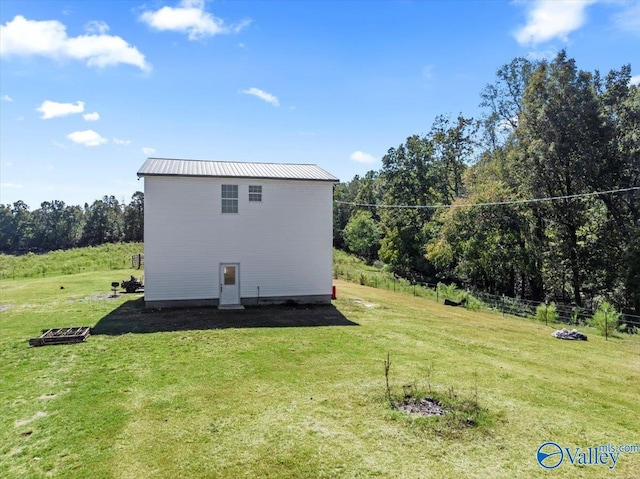 2403 Hog Jaw Rd, Arab, AL 35016 - back of property featuring a lawn and metal roof