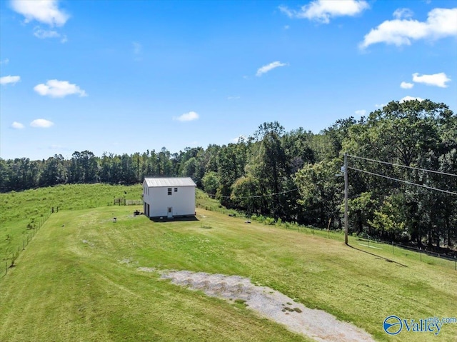2403 Hog Jaw Rd, Arab, AL 35016 - view of yard with an outbuilding, a shed, a rural view, and a forest view