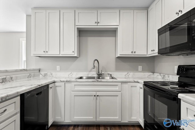 2403 Hog Jaw Rd, Arab, AL 35016 - kitchen with black appliances, white cabinets, and a sink