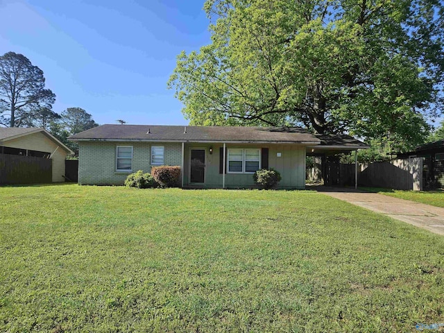 single story home featuring driveway, a carport, and brick siding