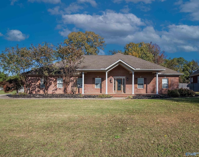 ranch-style home with a front yard