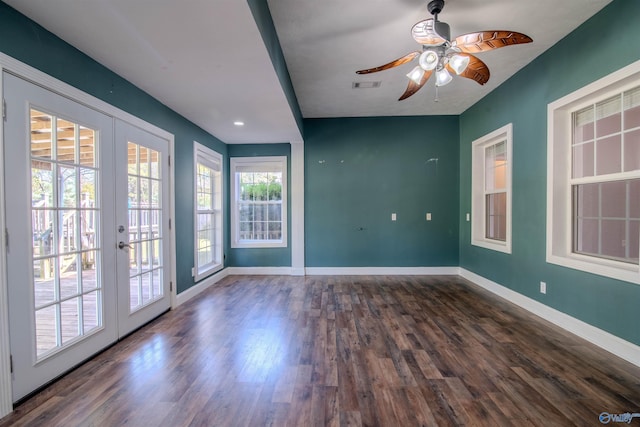 interior space with ceiling fan, dark hardwood / wood-style flooring, and french doors