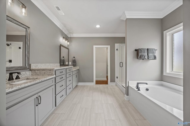 106 Timber Springs Ct, Madison, AL 35756 - bathroom with a shower stall, double vanity, a bath, ornamental molding, and baseboards