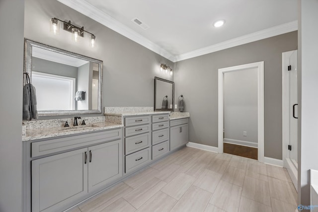 106 Timber Springs Ct, Madison, AL 35756 - full bath with double vanity, crown molding, a stall shower, and baseboards