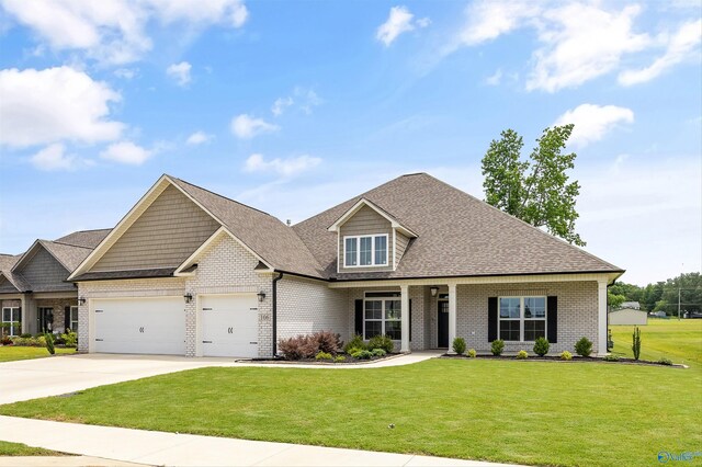 106 Timber Springs Ct, Madison, AL 35756 - craftsman-style home featuring brick siding, concrete driveway, a front yard, and an attached garage