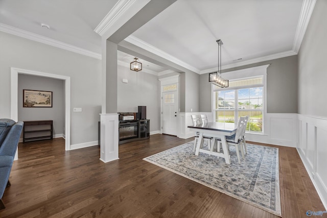 106 Timber Springs Ct, Madison, AL 35756 - dining space with ornamental molding, dark wood-type flooring, a chandelier, and wainscoting