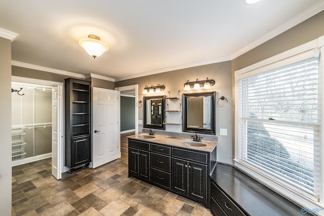 bathroom with vanity and crown molding