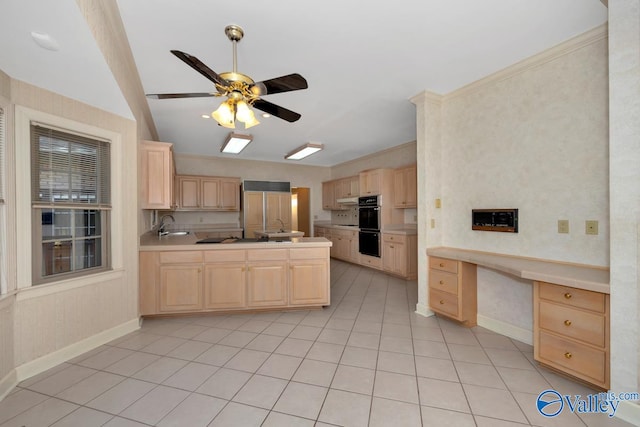 kitchen with ceiling fan, paneled built in fridge, built in desk, and light brown cabinetry