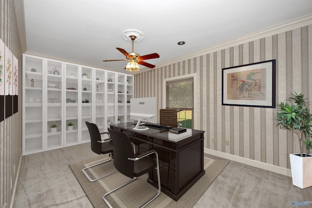 carpeted office with ceiling fan and crown molding