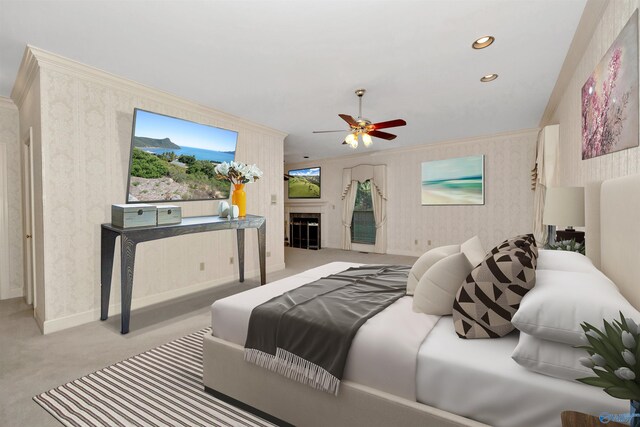 bedroom featuring ceiling fan, crown molding, and light colored carpet