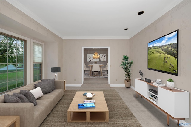 living room featuring carpet, crown molding, and a chandelier