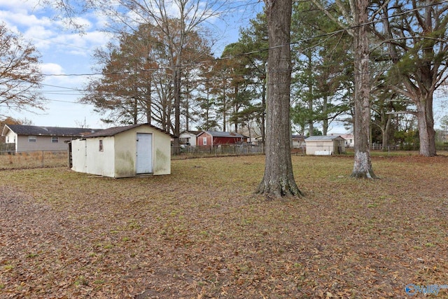 view of yard with a storage shed