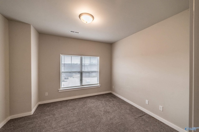 view of carpeted spare room