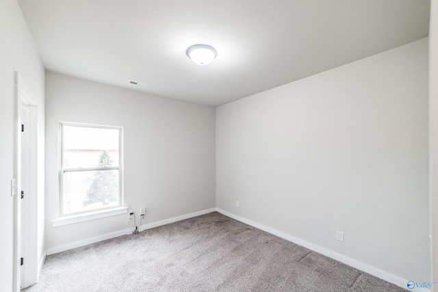 view of carpeted spare room