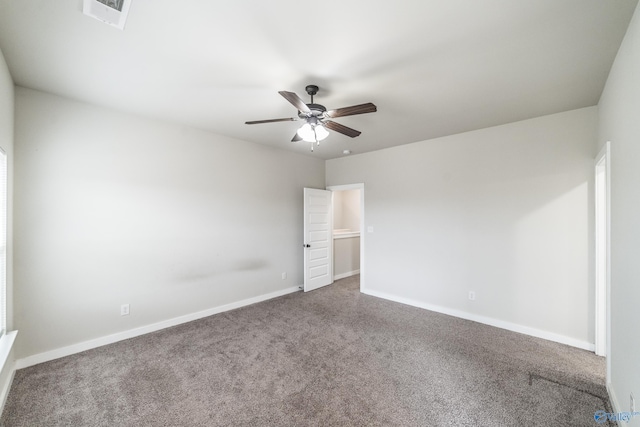 empty room with carpet flooring and ceiling fan