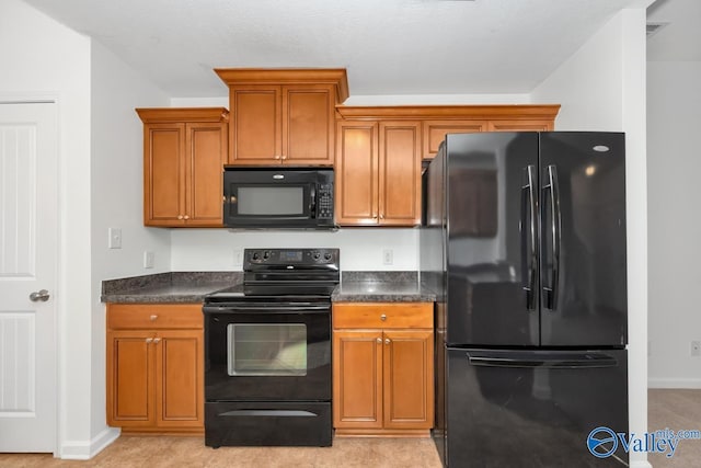 kitchen with black appliances