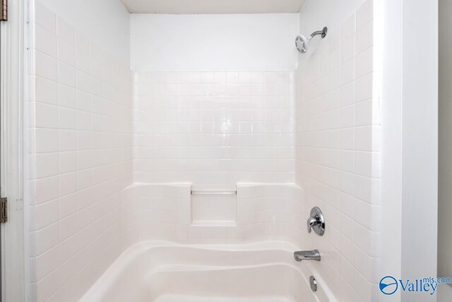 bathroom with shower / bath combination