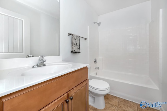 full bathroom featuring tile patterned flooring, vanity, toilet, and washtub / shower combination