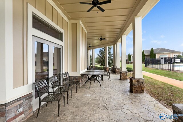 view of patio / terrace with french doors and ceiling fan