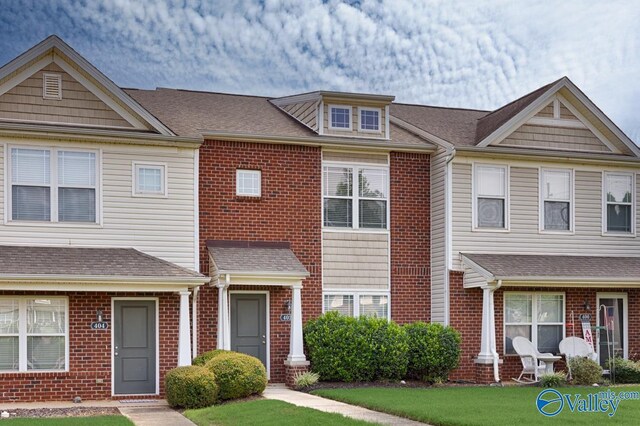 view of property with a front yard