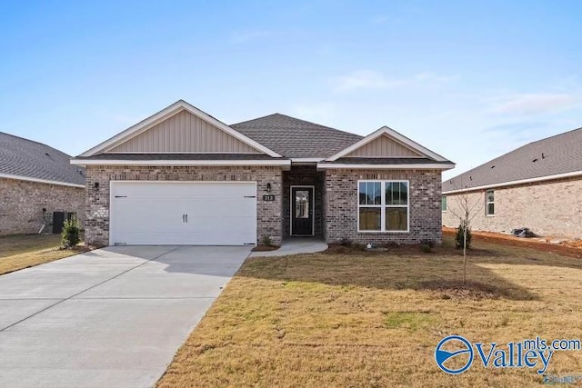 craftsman-style home with a front lawn and a garage