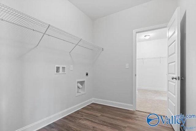 laundry area featuring hookup for a washing machine, dark hardwood / wood-style floors, and hookup for an electric dryer