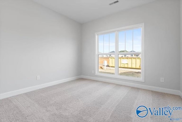 view of carpeted spare room