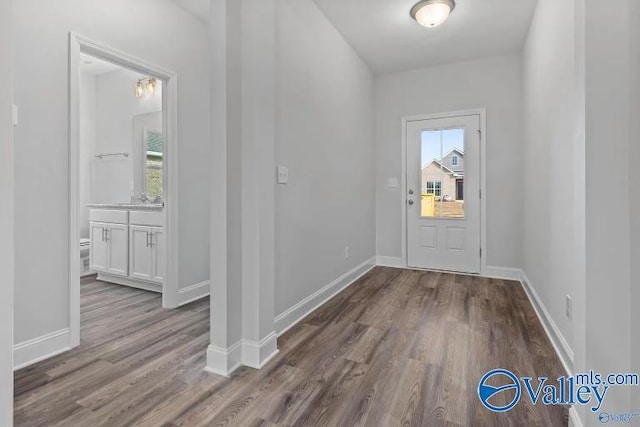 foyer with light wood-type flooring