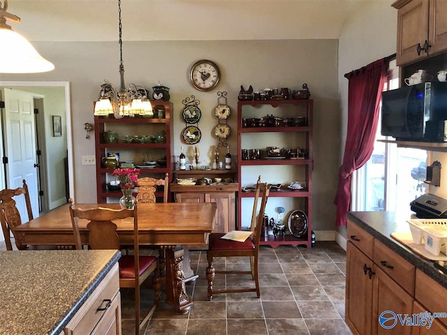 dining room featuring a chandelier