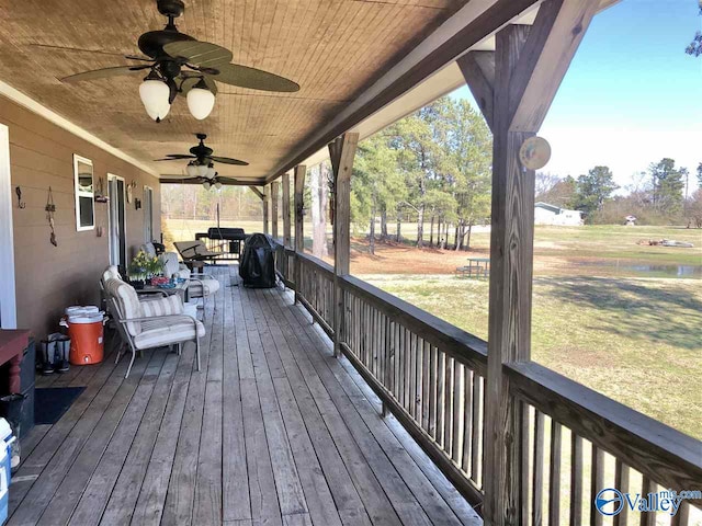 wooden deck featuring a porch