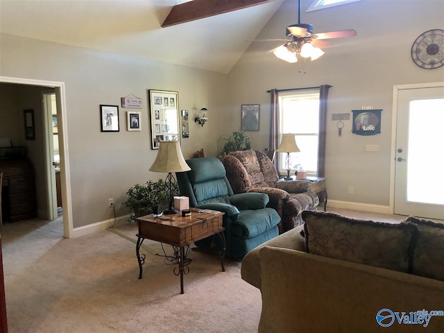 living room featuring light carpet, ceiling fan, and lofted ceiling